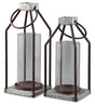 Set of two Diedrick lantern candle holders by Ashley Furniture, featuring rustic metal design and glass panels for decorative lighting.