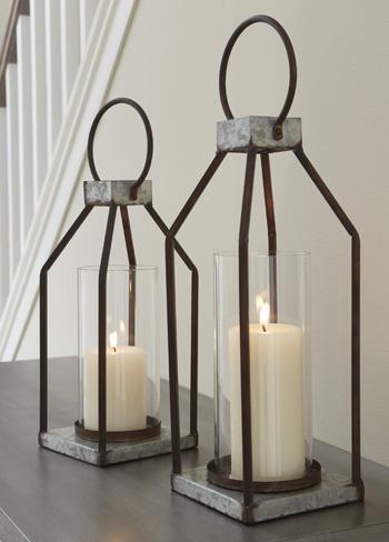 Set of two Diedrick Lantern candle holders by Ashley Furniture, featuring rustic metal design with glass panels.