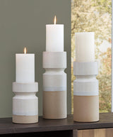 Set of three Ashley Furniture Hurston Candle Holders with rustic metal finish and varied heights for decorative tabletop display.