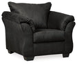 Ashley Furniture Darcy Chair with plush fabric upholstery and wooden legs, showcasing a modern, comfortable seating option.