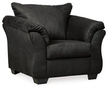 Ashley Furniture Darcy Chair with plush fabric upholstery and wooden legs, showcasing a modern, comfortable seating option.