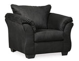 Ashley Furniture Darcy Chair with plush fabric upholstery and wooden legs, showcasing a modern, comfortable seating design.