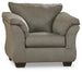 Ashley Darcy Chair with plush fabric upholstery and wooden legs, showcasing a modern, comfortable design.