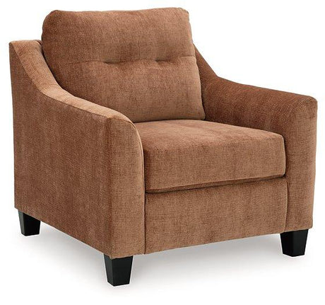 Ashley Furniture Amity Bay Chair with plush fabric and wooden legs, showcasing a comfortable and stylish living room seating option.