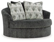 Oversized Ashley Furniture Biddeford swivel accent chair with plush fabric and modern design, perfect for living room decor.