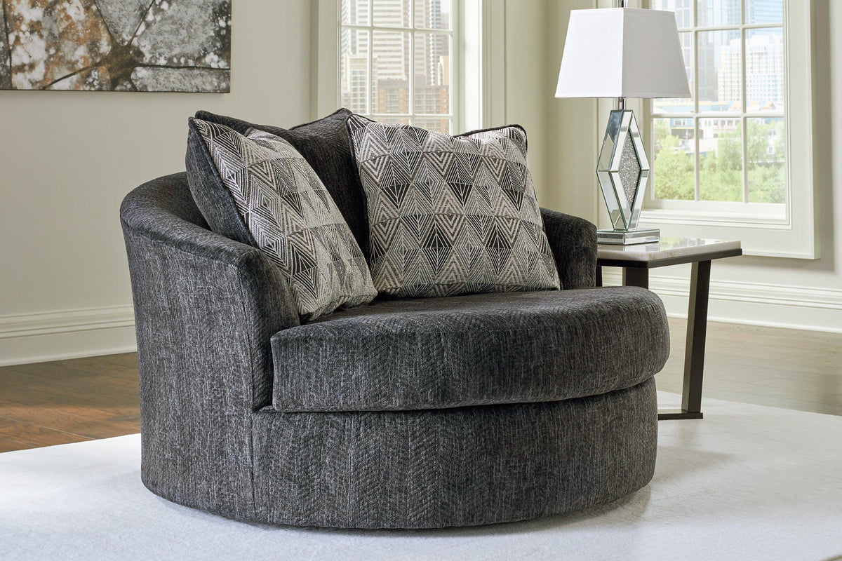 Ashley Furniture Biddeford oversized swivel accent chair with plush fabric and modern design in a cozy living room setting.