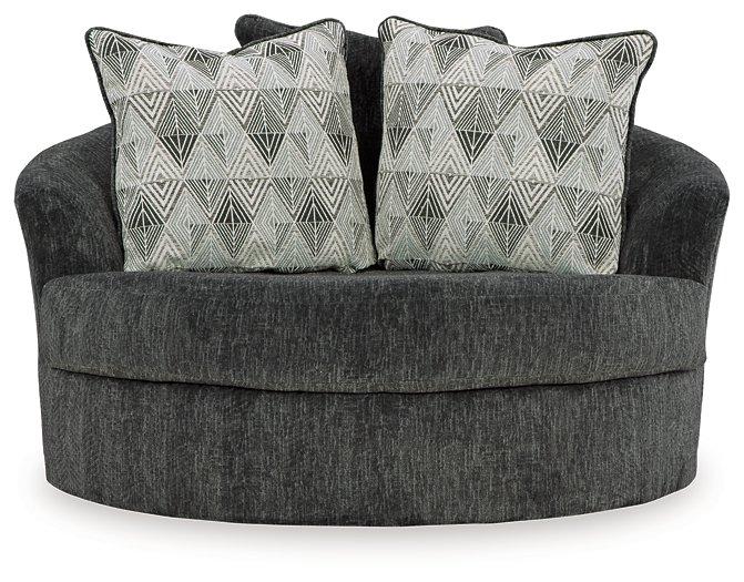 Ashley Furniture Biddeford oversized swivel accent chair with plush fabric and modern design, shown from a front angle.