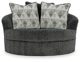 Ashley Furniture Biddeford oversized swivel accent chair with plush fabric and modern design, shown from a front angle.