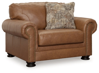 Ashley Furniture Carianna oversized chair with plush upholstery and wide armrests, shown from an angled view.