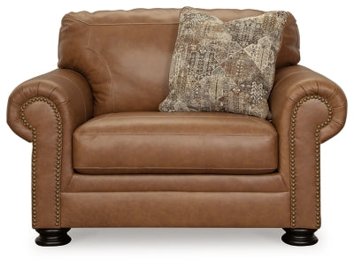 Ashley Furniture Carianna oversized chair with plush upholstery and wide armrests, shown from a front head-on view.