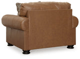 Ashley Furniture Carianna oversized chair with plush fabric, shown from the back in a stylish living room setting.