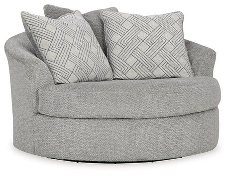 Ashley Casselbury oversized swivel accent chair with plush upholstery and contemporary design, shown in a modern living room setting.
