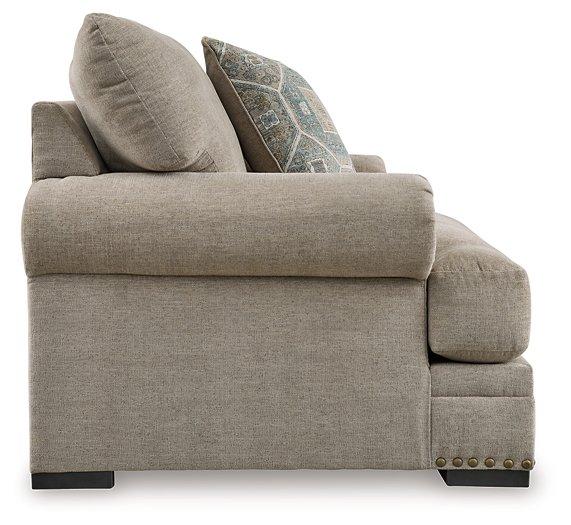 Oversized Ashley Furniture Galemore Chair with plush fabric and wide seating, perfect for a modern living room.