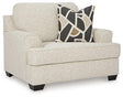 Oversized Ashley Furniture Heartcort chair with plush cushions and wide seating for modern, comfortable living room decor.