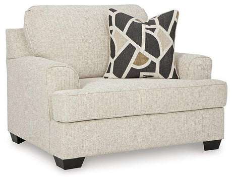 Oversized Ashley Furniture Heartcort chair with plush cushions and wide seating for modern, comfortable living room decor.