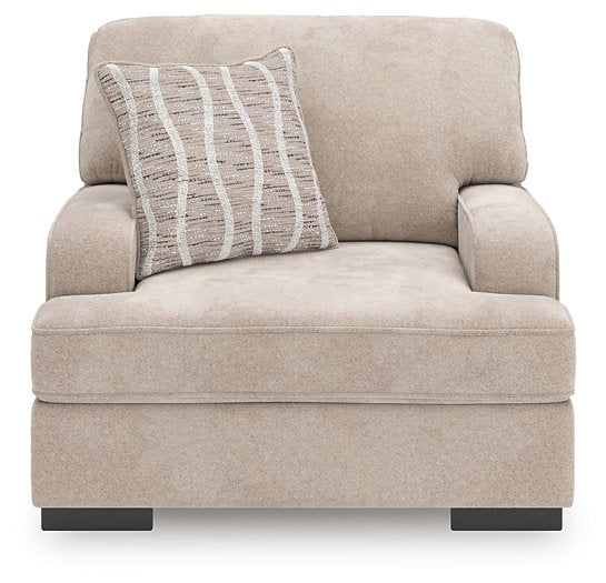 Ashley Furniture high profile oversized chair with plush upholstery and a modern design, shown from a front head-on view.