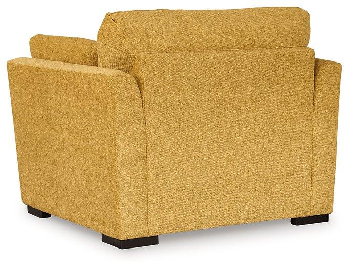 Oversized Ashley Furniture Keerwick chair with plush cushions and textured fabric, perfect for a modern living room.