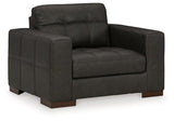 Ashley Furniture Luigi oversized chair with plush upholstery, modern design, and comfortable wide seating in a stylish living room setting.