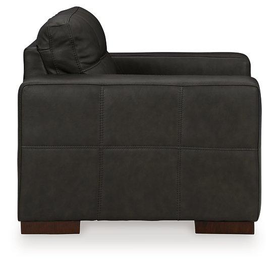 Large Luigi Oversized Chair by Ashley Furniture with plush fabric and wide armrests, perfect for a modern living room.