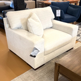 Ashley Furniture Newport oversized chair with plush fabric and wide seating, shown in a cozy, modern living room setting.
