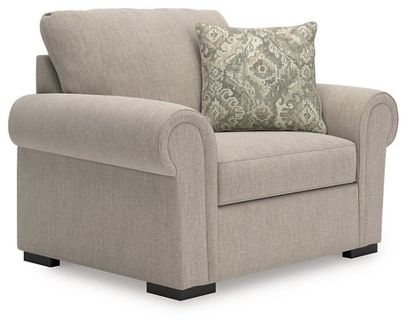 Ashley Furniture Sararose oversized chair with plush fabric and wide armrests, shown from an angled side view.