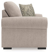 Ashley Furniture Sararose oversized chair with plush upholstery and wide armrests, shown from a side angle.