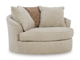 Ashley Furniture Steelwater Retreat oversized swivel accent chair with plush upholstery and wide armrests, shown from an angled view.