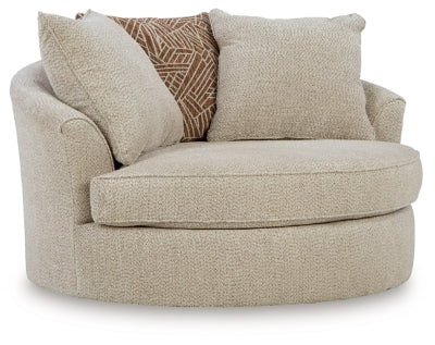 Ashley Furniture Steelwater Retreat oversized swivel accent chair with plush upholstery and rounded armrests, shown from an angled view.