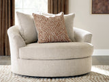 Ashley Furniture Steelwater Retreat oversized swivel accent chair with plush upholstery and rounded armrests.