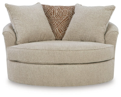 Ashley Furniture Steelwater Retreat oversized swivel accent chair with plush upholstery and rounded armrests.