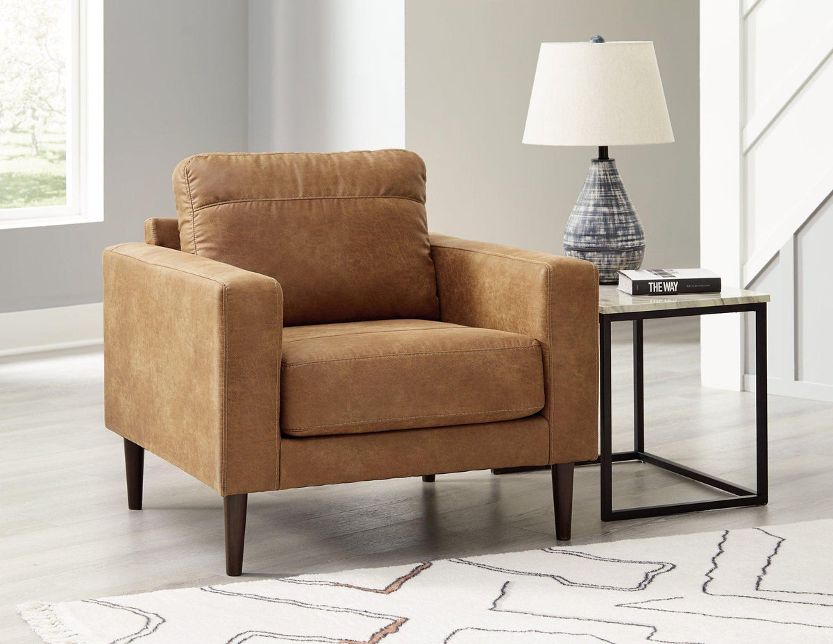 Ashley Furniture Telora chair with plush fabric upholstery and modern design, shown in a contemporary living room setting.