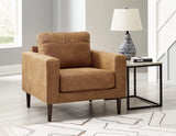 Ashley Furniture Telora chair with plush fabric upholstery and modern design, shown in a contemporary living room setting.