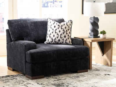 Ashley Furniture Whitmore Manor Oversized Chair with plush fabric and wide seating, perfect for a cozy living room.