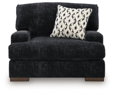 Ashley Furniture Whitmore Manor oversized chair with plush upholstery and wide armrests, shown from a head-on view.