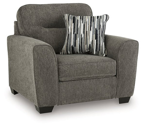 Ashley Furniture Olten oversized chair with plush upholstery and wide seating, shown from a stylish angled view.
