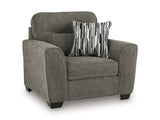 Ashley Furniture Olten oversized chair with plush fabric, wide armrests, and a comfortable cushioned seat, shown from an angled view.