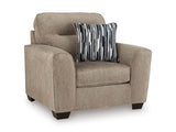 Ashley Furniture Olten oversized chair with plush fabric and wide seating, shown from an angled view.