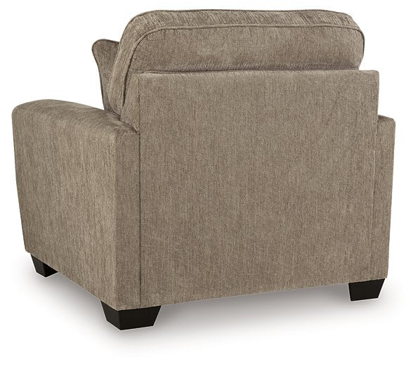 Ashley Furniture Olten oversized chair with plush fabric, wide armrests, and comfortable backrest, shown from the back view.