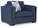 Ashley Furniture Evansley oversized chair with plush fabric and wide seating, perfect for modern living room decor.