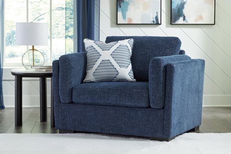 Ashley Furniture Evansley oversized chair with plush upholstery and wide seating, perfect for a modern living room.