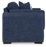 Oversized Ashley Furniture Evansley Chair with plush fabric and wide armrests, perfect for a cozy living room seating area.