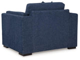 Ashley Furniture Evansley oversized chair with plush upholstery and wide armrests, perfect for a modern living room.