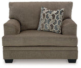 Oversized Ashley Furniture Stonemeade chair with plush fabric and wide seating for comfortable relaxation.
