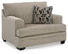Oversized Ashley Furniture Stonemeade chair with plush fabric and wide, comfortable seating, perfect for living room relaxation.