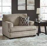 Oversized Ashley Furniture Stonemeade chair with plush fabric and wide armrests, perfect for a cozy living room seating area.