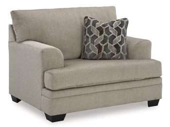 Oversized Ashley Furniture Stonemeade Chair with plush cushions and wide armrests, perfect for a cozy living room seating area.