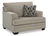 Oversized Ashley Furniture Stonemeade Chair with plush cushions and wide armrests, perfect for a cozy living room seating area.