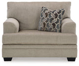 Oversized Ashley Furniture Stonemeade chair with plush cushions and soft fabric in a cozy living room setting.
