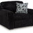 Ashley Furniture Midnight-Madness oversized chair with plush fabric and wide armrests, shown from an angled side view.