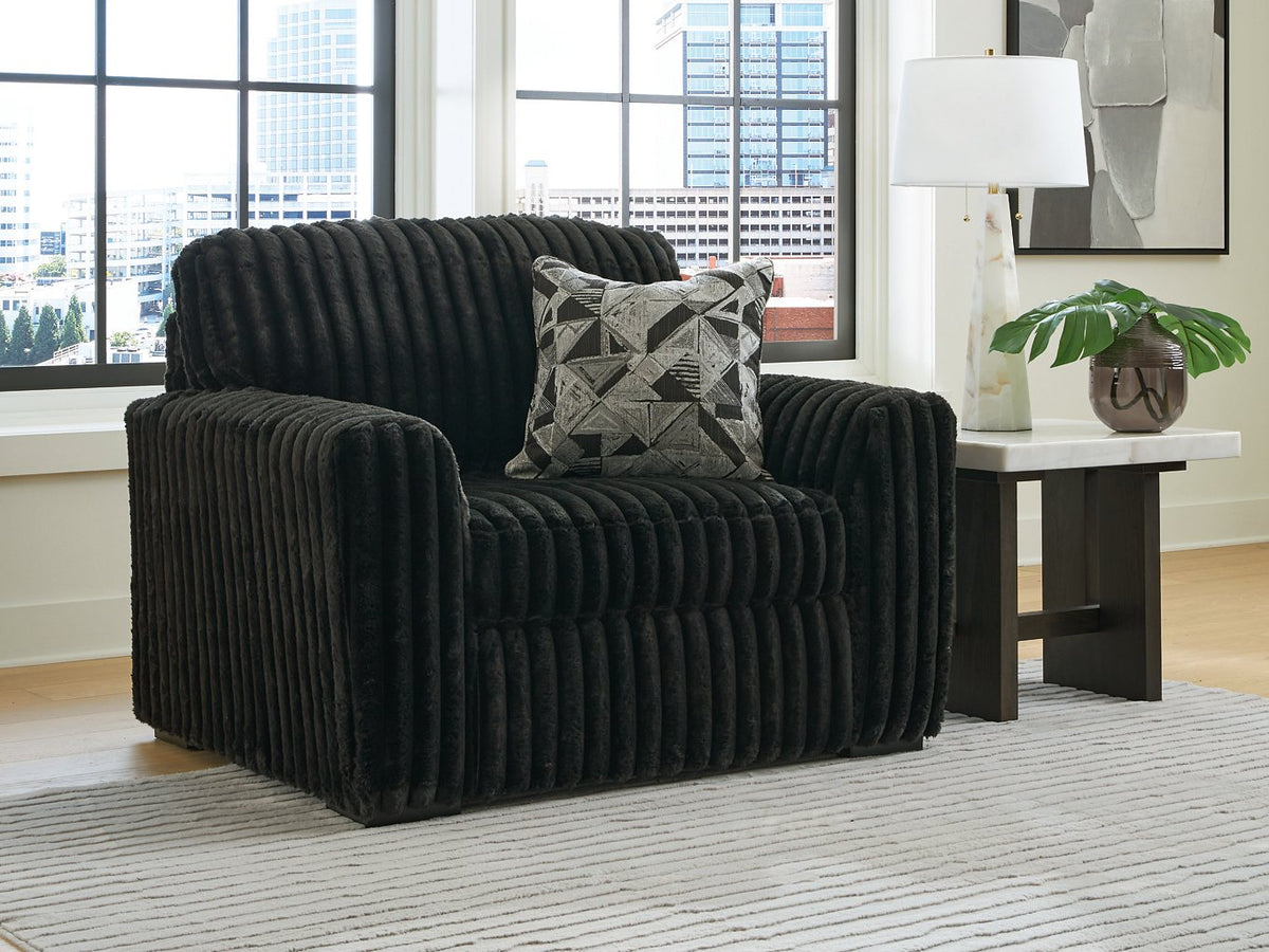 Ashley Furniture Midnight-Madness oversized chair with plush fabric and wide seating, perfect for lounging and relaxation.